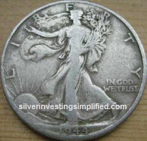 Walking Liberty half-dollar prior to cleaning.